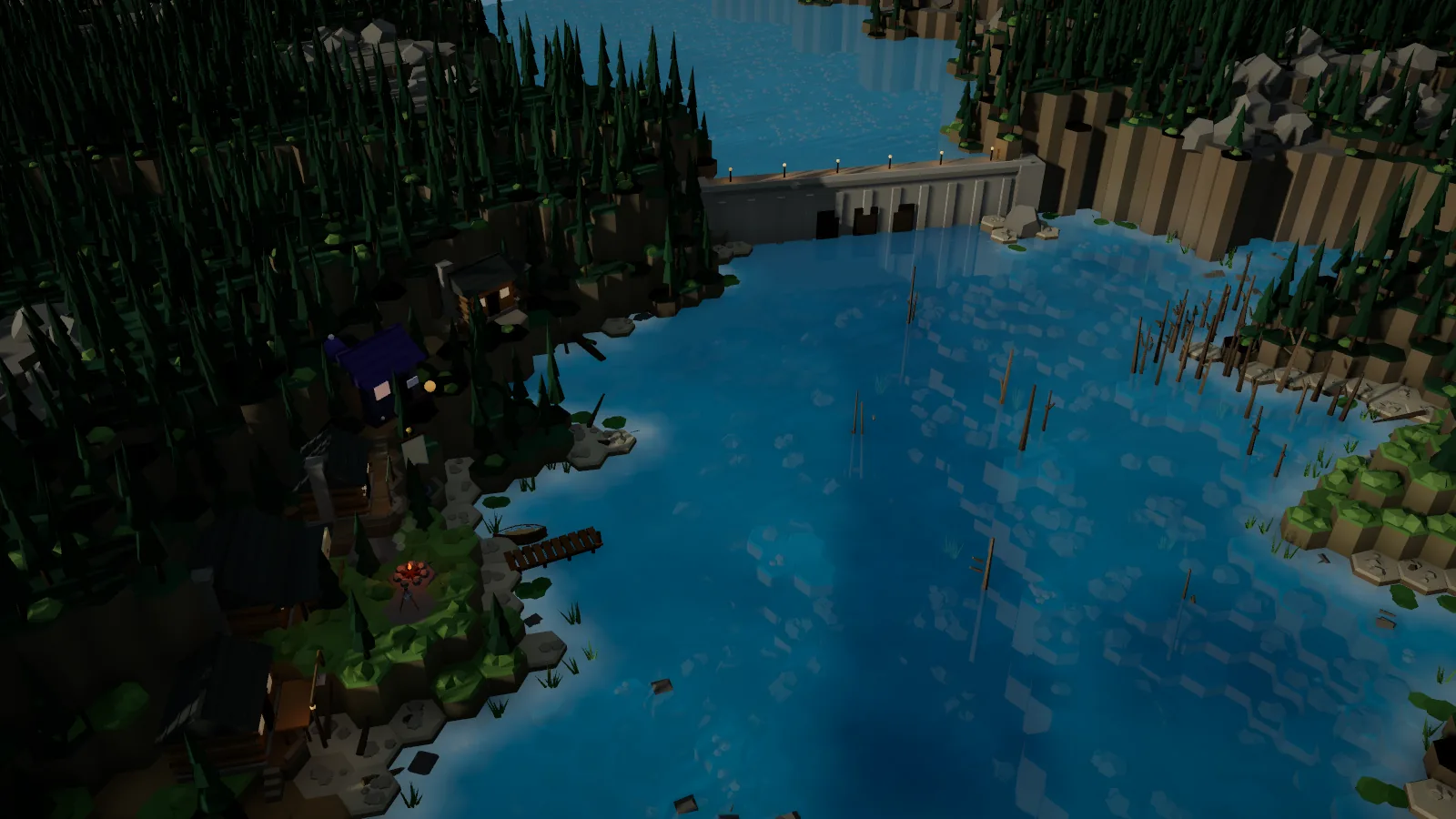 The Great Dam at sundown: the lamps on the wall lit, the village campfire burning and the reservoir still blue.